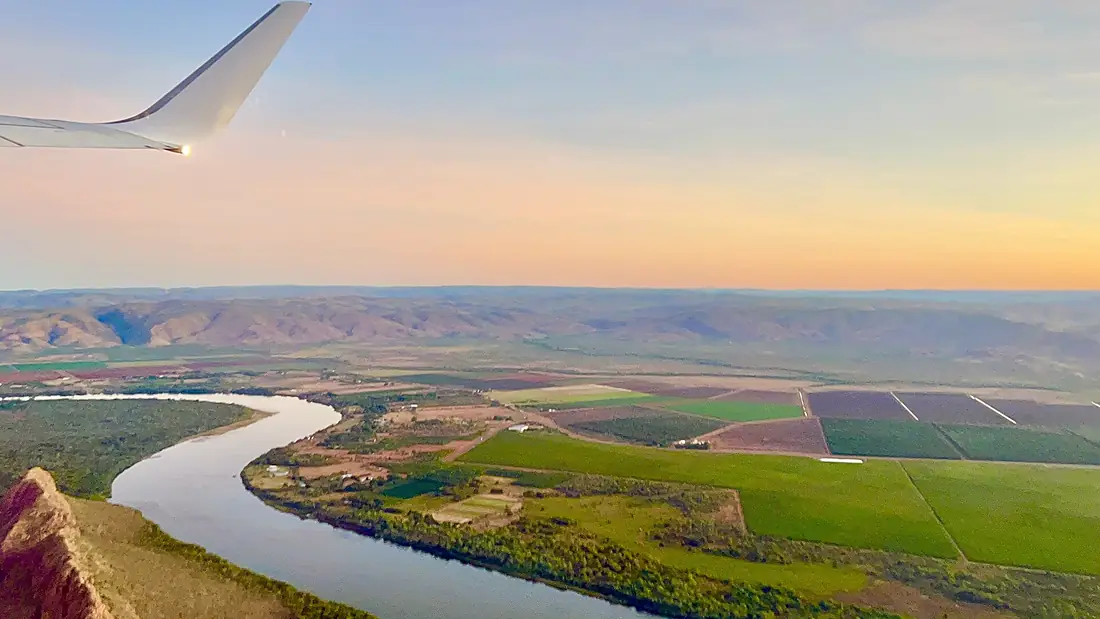 Aerial view of Ord River following take off from East Kimberley Regional Airport, Kununurra, WA, 2022