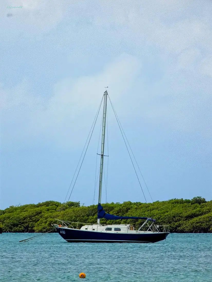 Large sailing boat docked off the coast of Oranjestad Aruba
